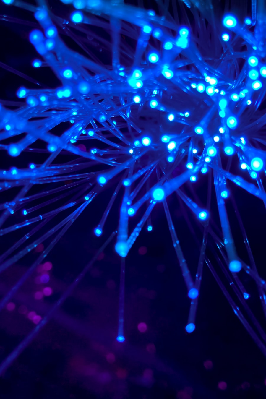 IT infrastructure services — glowing fibre-optic strands in a UK data centre